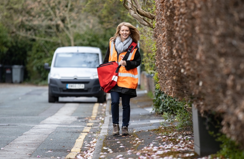 Esther delivering the mail