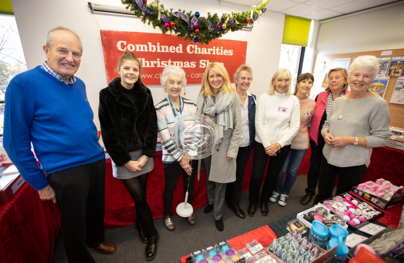 Esther with volunteers in the shop