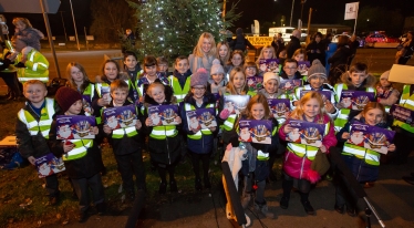 Esther with pupils from Lostock Gralam Primary School- and their selection boxes!