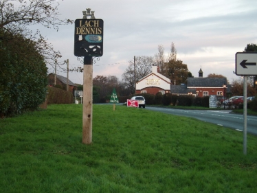 Lach Dennis village sign