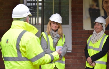 Esther with Headteacher Ana Roslan, hearing about the renovation